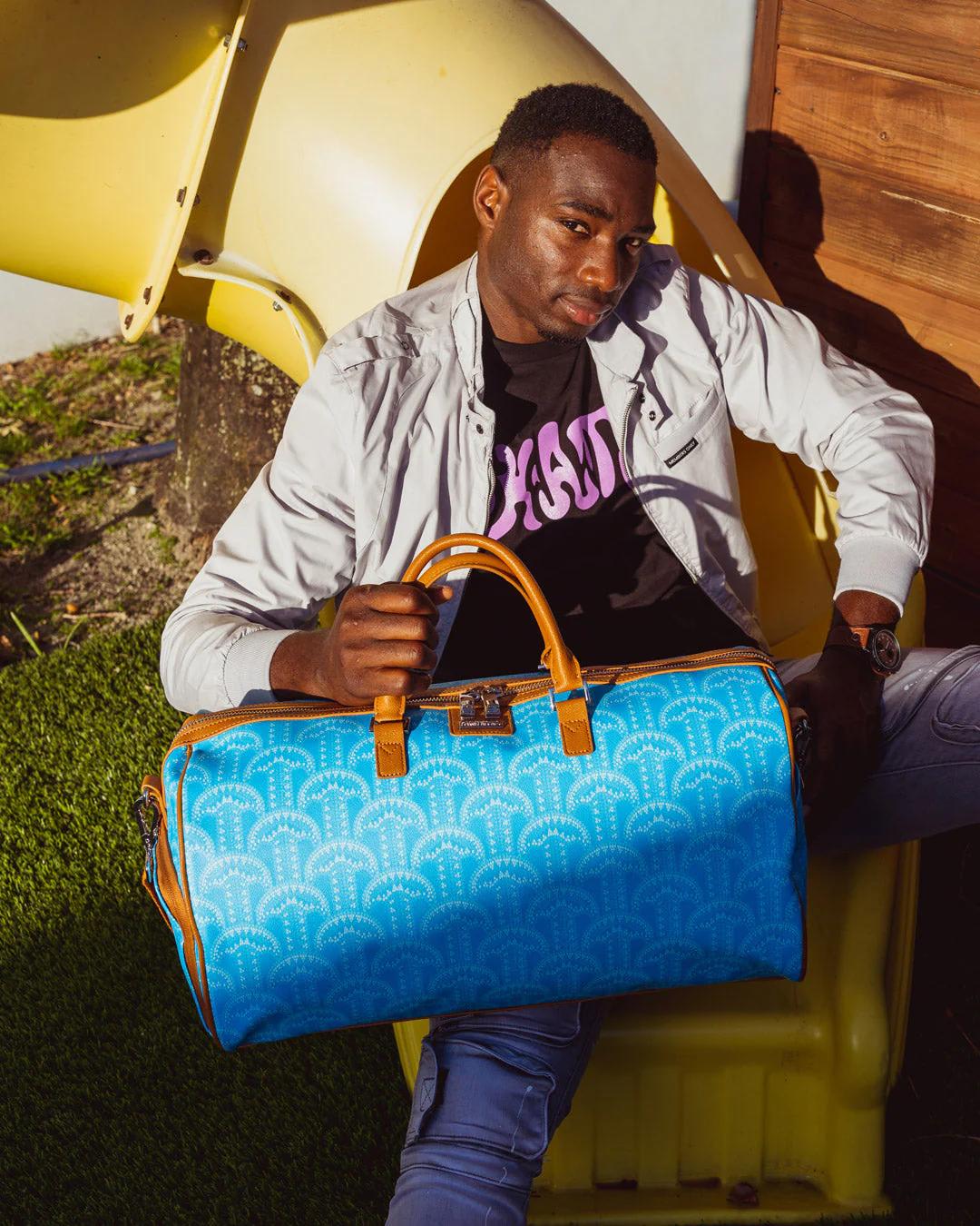 Sprayground Trending | ILLUCHAINS TURQ DUFFLE