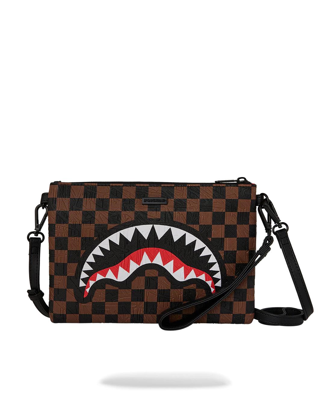 Sprayground Featured | THE PRIVATE JET SHARK CLUB CROSSOVER CLUTCH