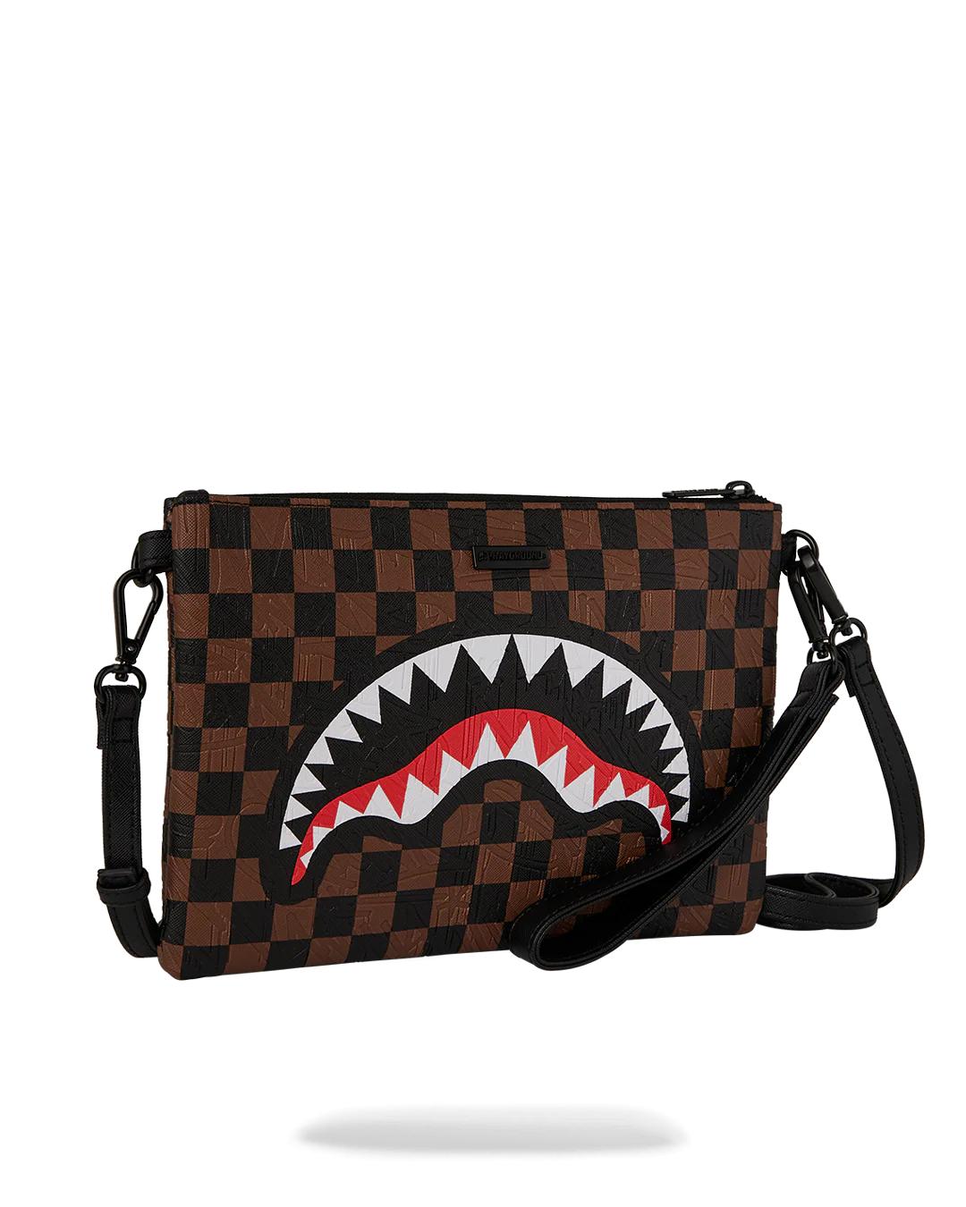 Sprayground Featured | THE PRIVATE JET SHARK CLUB CROSSOVER CLUTCH