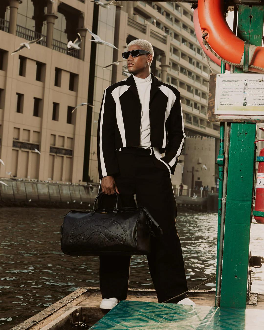 Sprayground Premium | GOLD BRICK DRIP DUFFLE