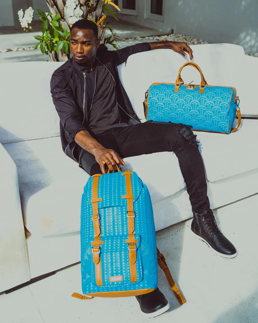 Sprayground Trending | ILLUCHAINS TURQ HILLS BACKPACK