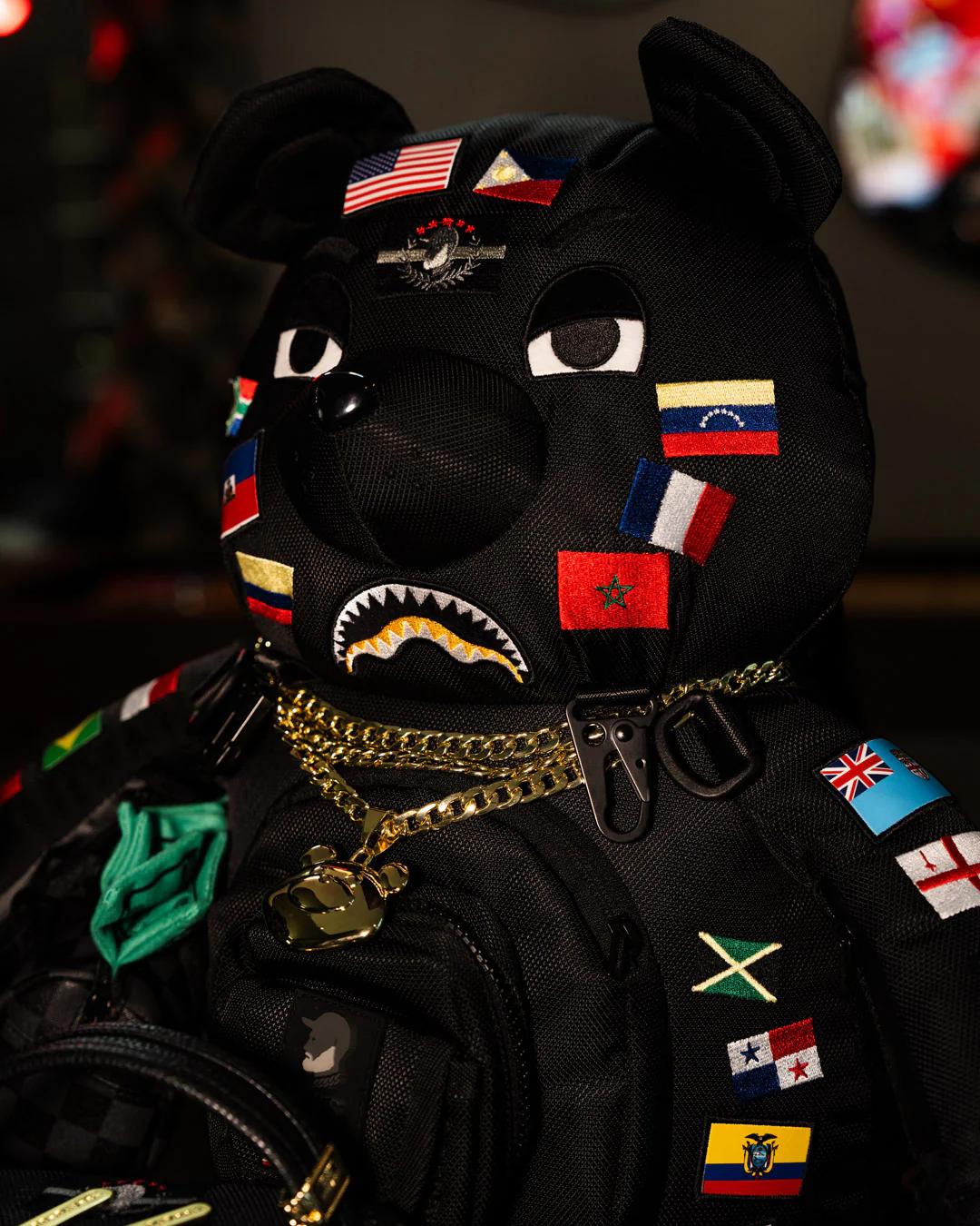 Sprayground Essential | JAMES FIRST CLASS GLOBAL FLAGS MONEYBEAR BACKPACK