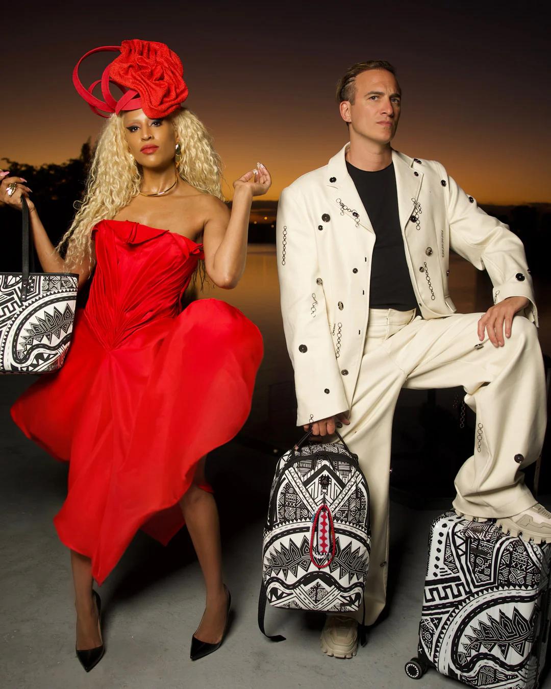 Sprayground Essential | A.I. AFRICAN INTELLIGENCE THE SKYHAWK WING TOTE - SANDFLOWER COLLAB