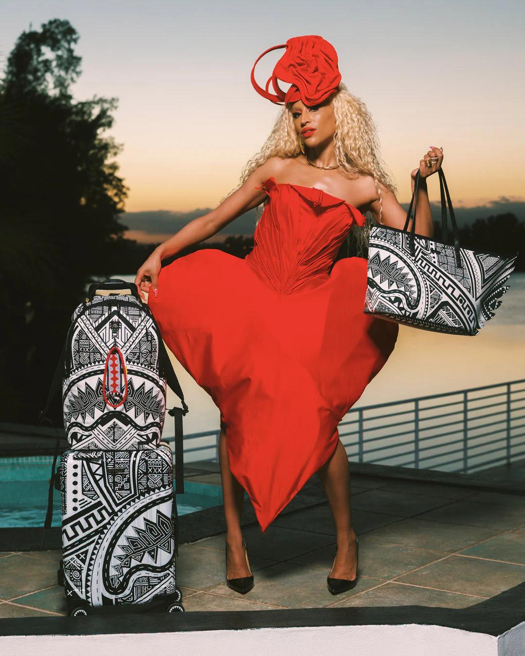 Sprayground Essential | A.I. AFRICAN INTELLIGENCE THE SKYHAWK WING TOTE - SANDFLOWER COLLAB