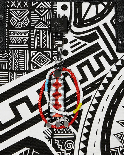 Sprayground Essential | A.I. AFRICAN INTELLIGENCE THE SKYHAWK WING TOTE - SANDFLOWER COLLAB