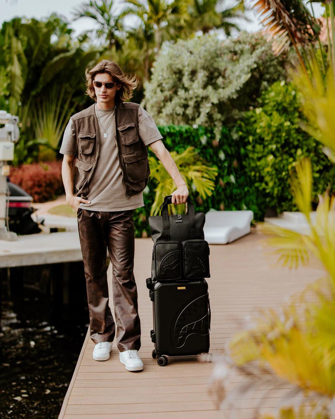 Sprayground Signature | REALITY CHECK SHARKITECTURE CARRY-ON JETBLACK LUGGAGE (GOLD HARDWARE)