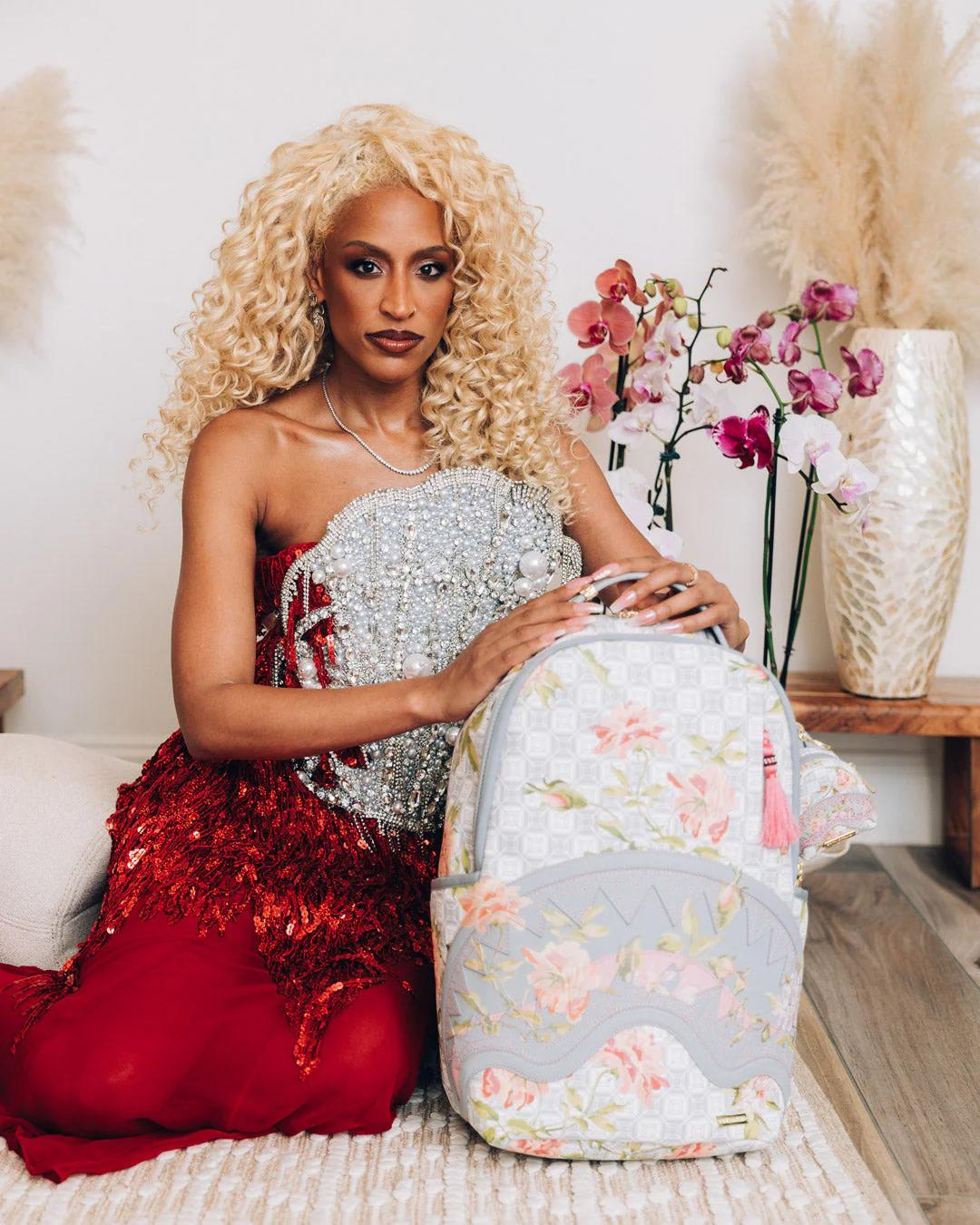 Sprayground Featured | A.I. AFRICAN INTELLIGENCE ELEGANT ENERGY BACKPACK - SANDFLOWER COLLAB