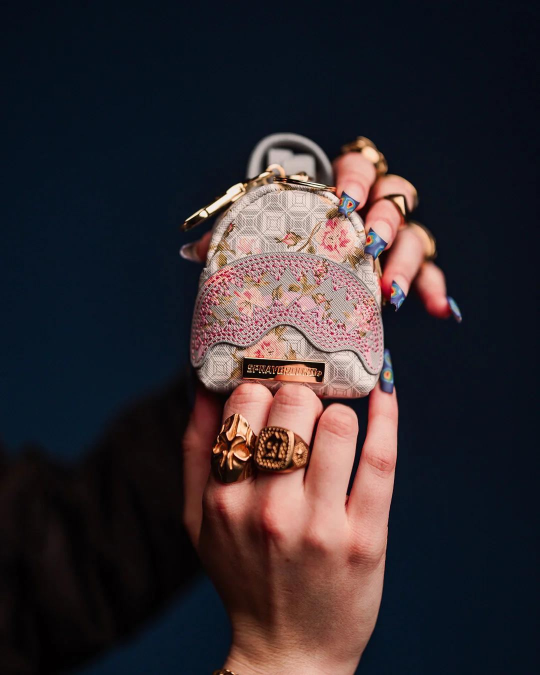 Sprayground Best Seller | A.I. AFRICAN INTELLIGENCE ELEGANT ENERGY BACKPACK KEYCHAIN