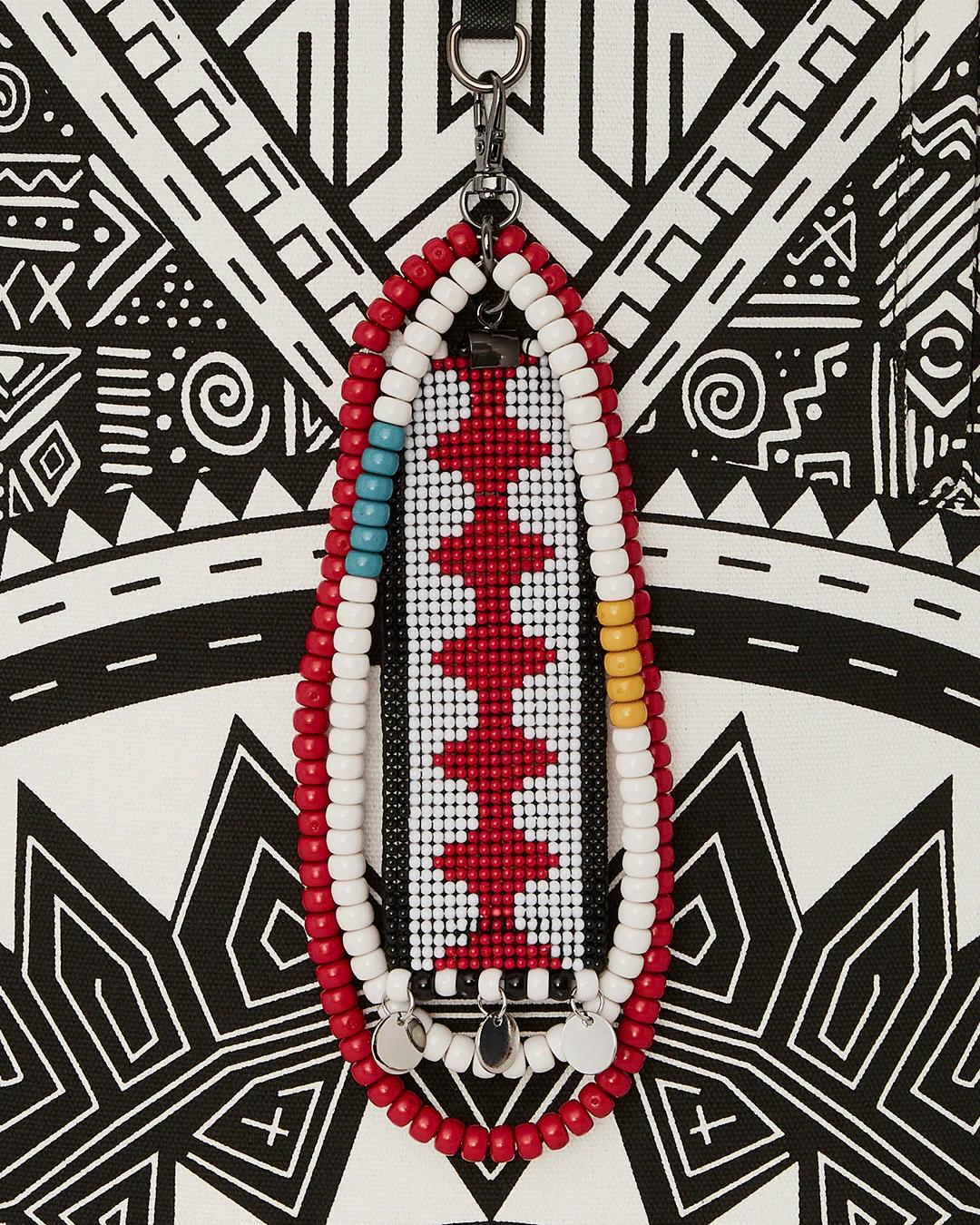 Sprayground Signature | A.I. AFRICAN INTELLIGENCE THE SKYHAWK BACKPACK - SANDFLOWER COLLAB