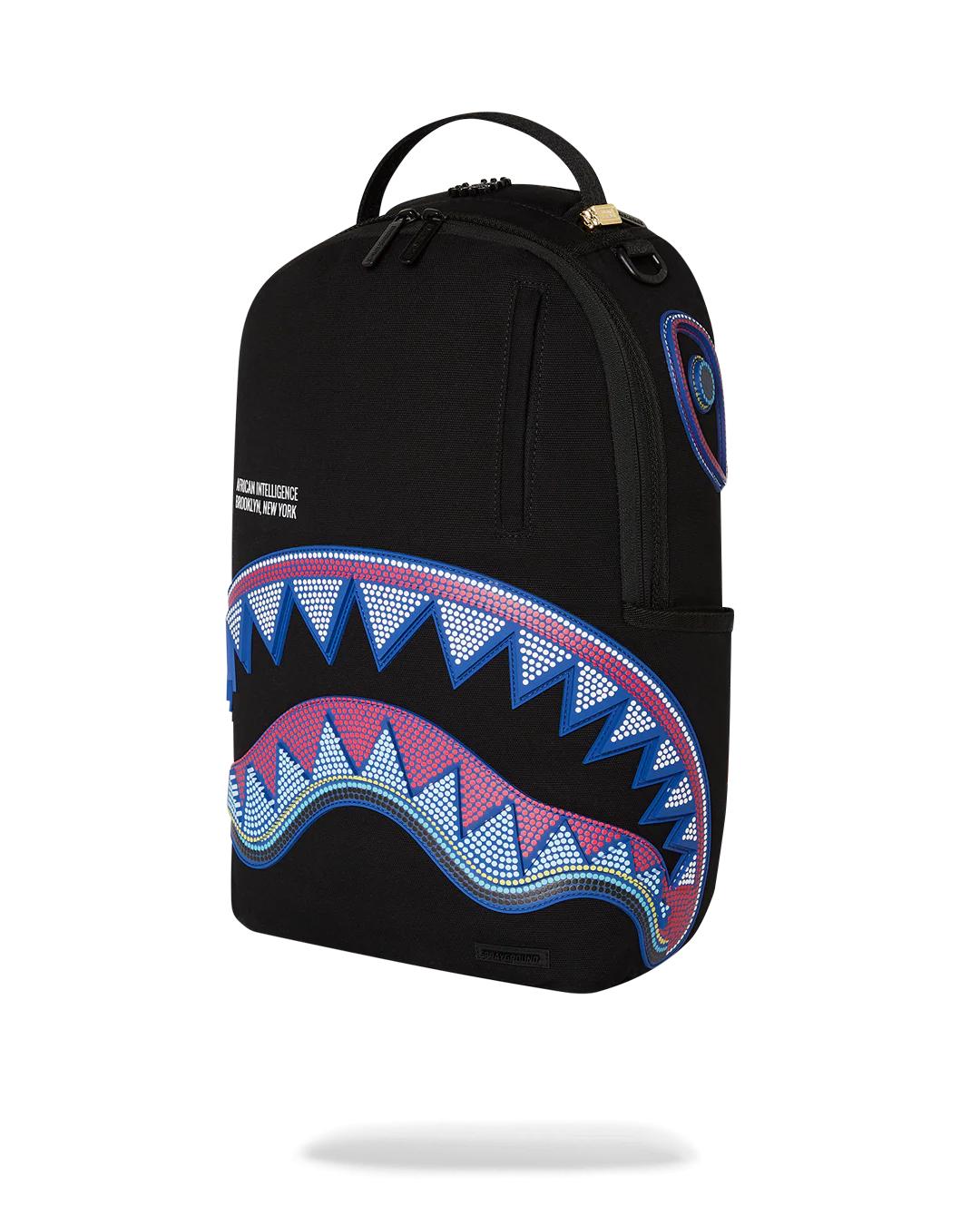 Sprayground Classic | A.I. AFRICAN INTELLIGENCE BORN AND RAISED BACKPACK - SANDFLOWER COLLAB