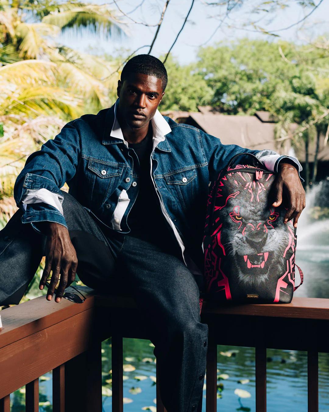 Sprayground New | A.I. AFRICAN INTELLIGENCE PRIDE AND POWER BACKPACK - SANDFLOWER COLLAB