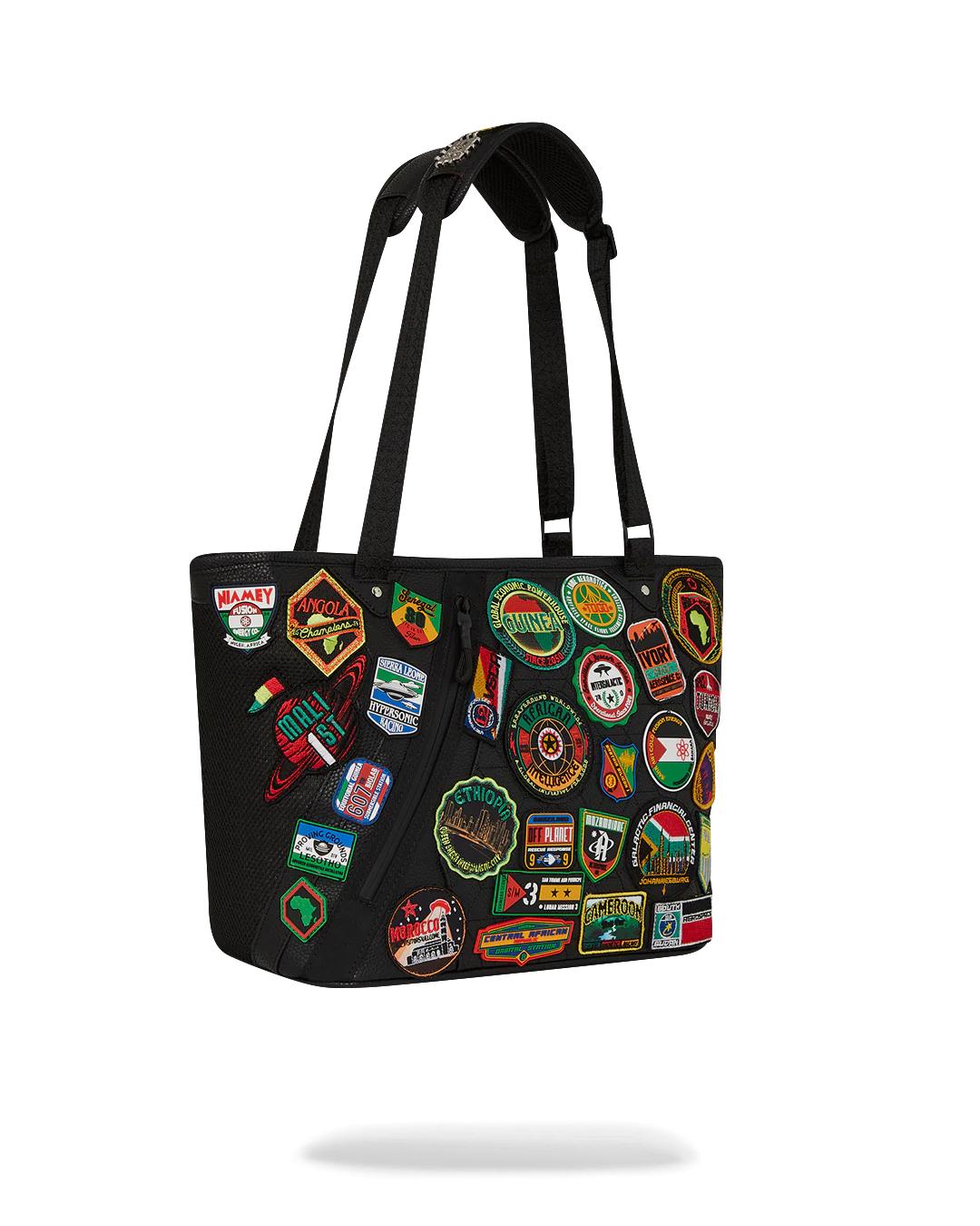 Sprayground New | A.I. THE 54 (PATCHES OF AFRICA) CARGO TOTE