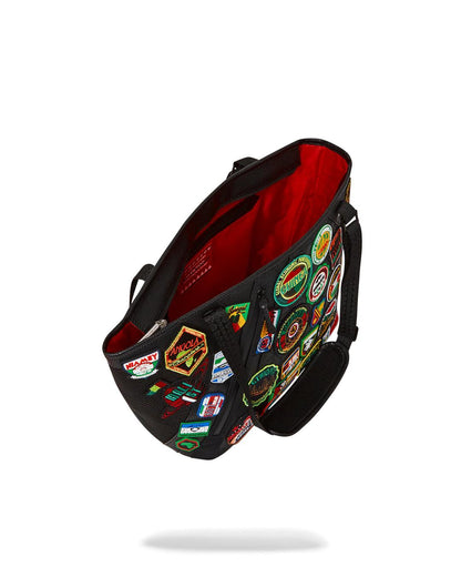 Sprayground New | A.I. THE 54 (PATCHES OF AFRICA) CARGO TOTE