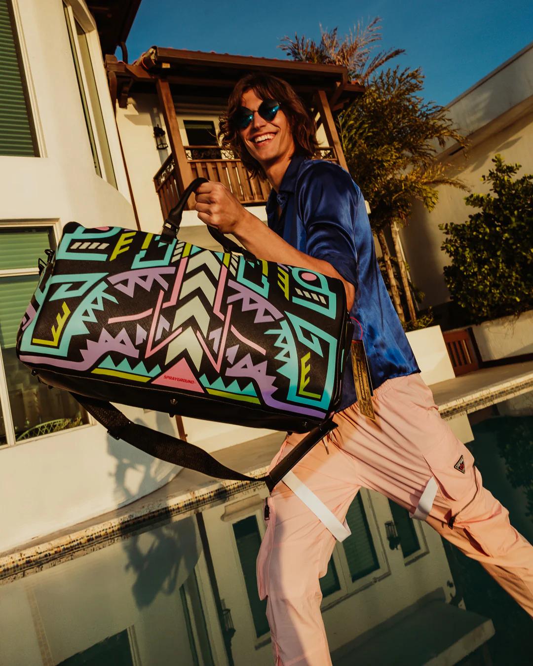Sprayground Signature | A.I. PATH TO THE FUTURE III DUFFLE - SANDFLOWER COLLAB (GLOW IN THE DA