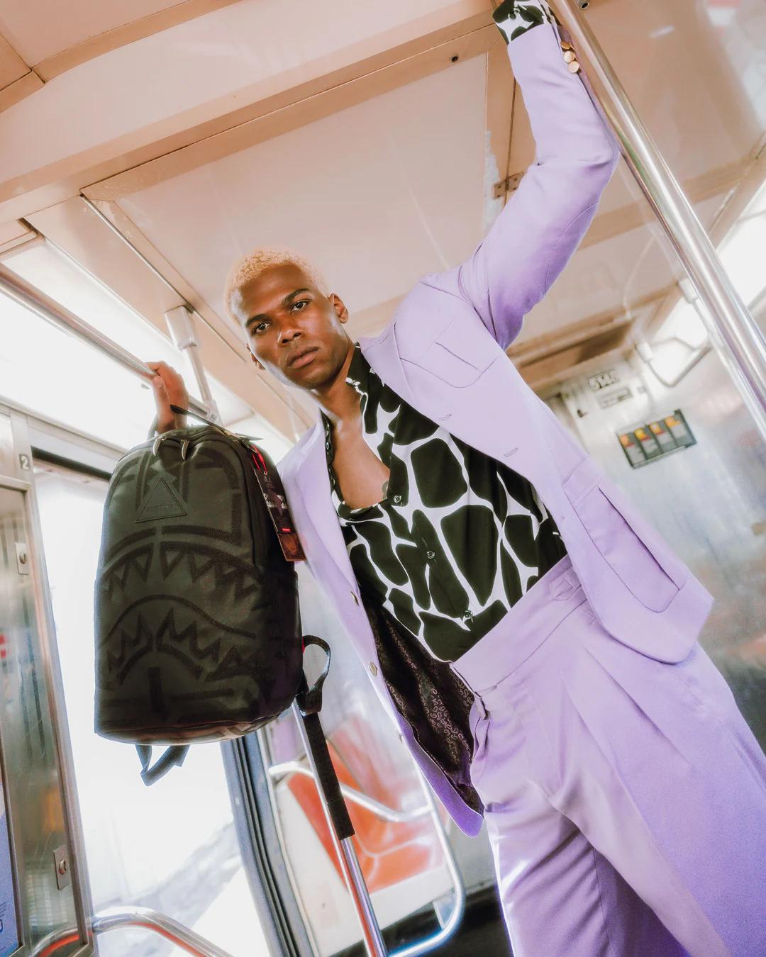 Sprayground Premium | AFRICAN INTELLIGENCE 9 APEX GENIUS BACKPACK - SANDFLOWER COLLAB