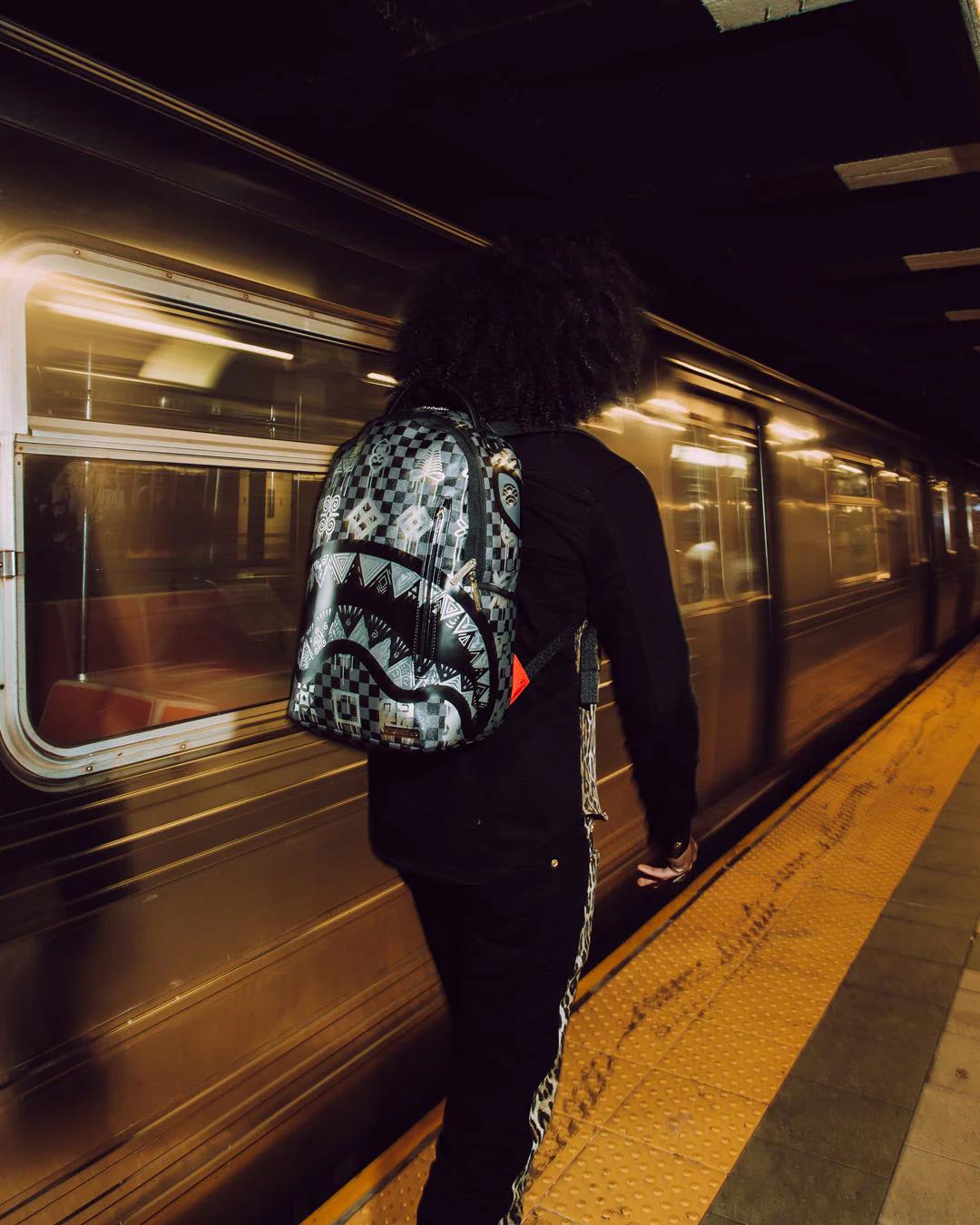 Sprayground New | AFRICAN INTELLIGENCE 9 POWER GLYPHICS BACKPACK - SANDFLOWER COLLAB