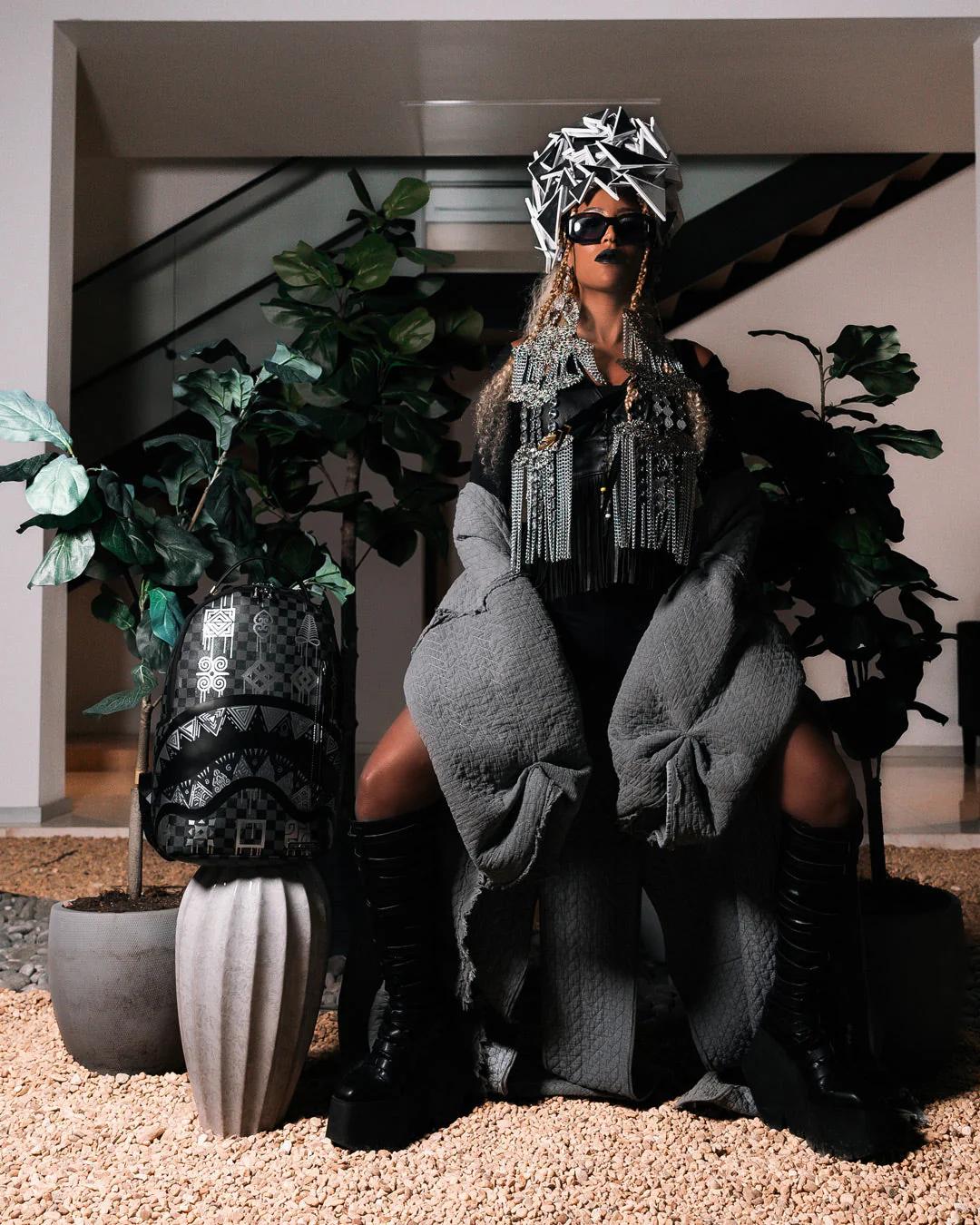 Sprayground New | AFRICAN INTELLIGENCE 9 POWER GLYPHICS BACKPACK - SANDFLOWER COLLAB