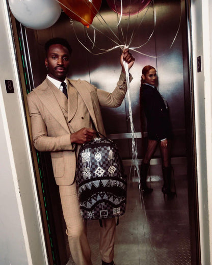 Sprayground New | AFRICAN INTELLIGENCE 9 POWER GLYPHICS BACKPACK - SANDFLOWER COLLAB