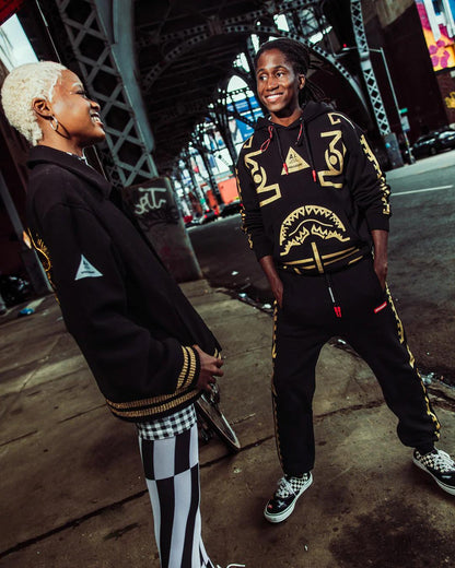 Sprayground Featured | A.I.9 AFRICAN INTELLIGENCE GUILDED LEOPARD - SANDFLOWER COLLAB VARSITY