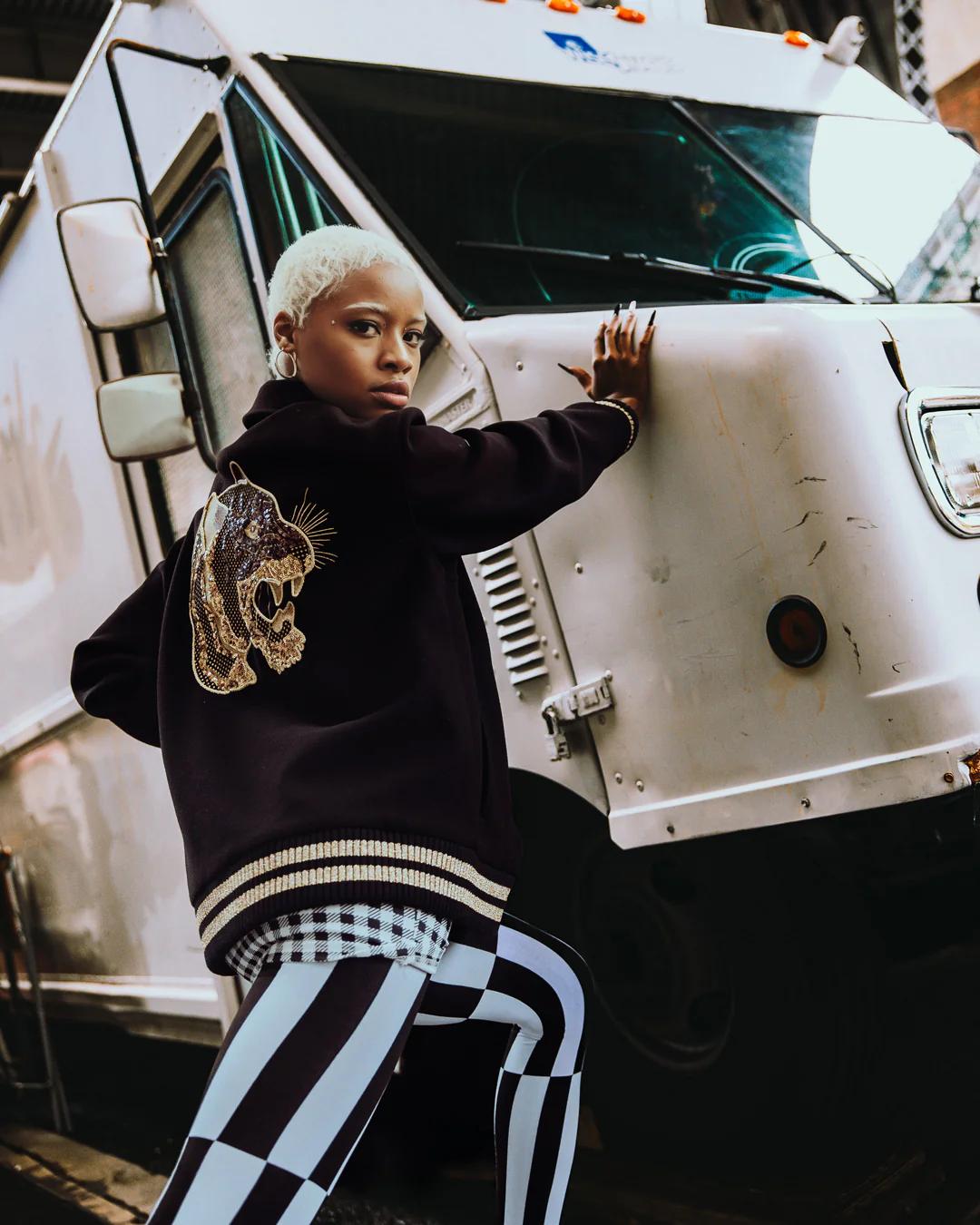 Sprayground Featured | A.I.9 AFRICAN INTELLIGENCE GUILDED LEOPARD - SANDFLOWER COLLAB VARSITY