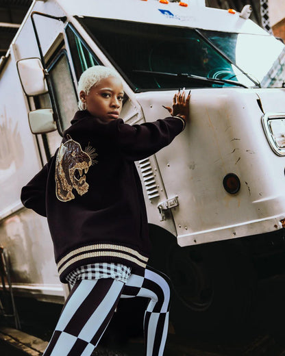 Sprayground Featured | A.I.9 AFRICAN INTELLIGENCE GUILDED LEOPARD - SANDFLOWER COLLAB VARSITY