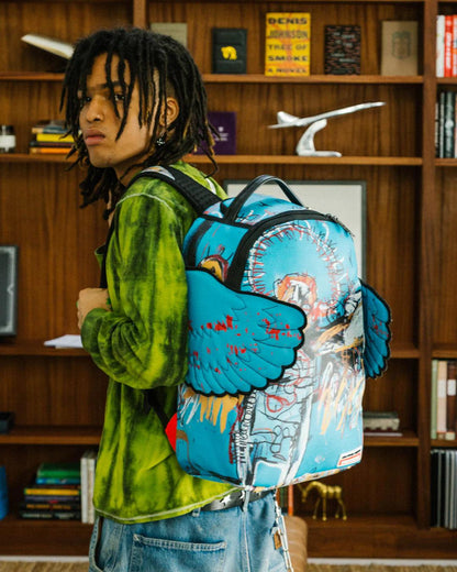 Sprayground Essential | OFFICIAL BASQUIAT UNTITLED (FALLEN ANGEL) 1981 WING BACKPACK (DLXV)