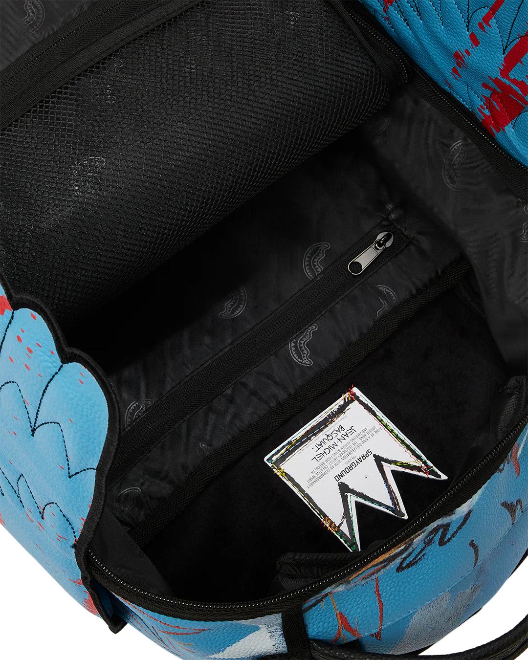 Sprayground Essential | OFFICIAL BASQUIAT UNTITLED (FALLEN ANGEL) 1981 WING BACKPACK (DLXV)