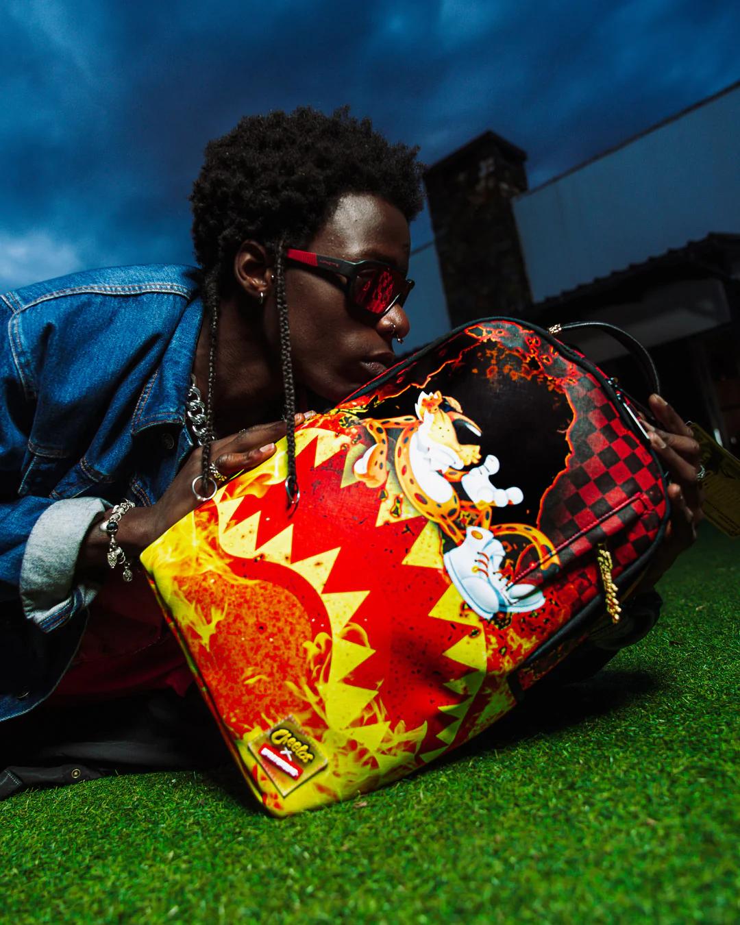 Sprayground Best Seller | CHEETOS TOO HOT TO HANDLE BACKPACK