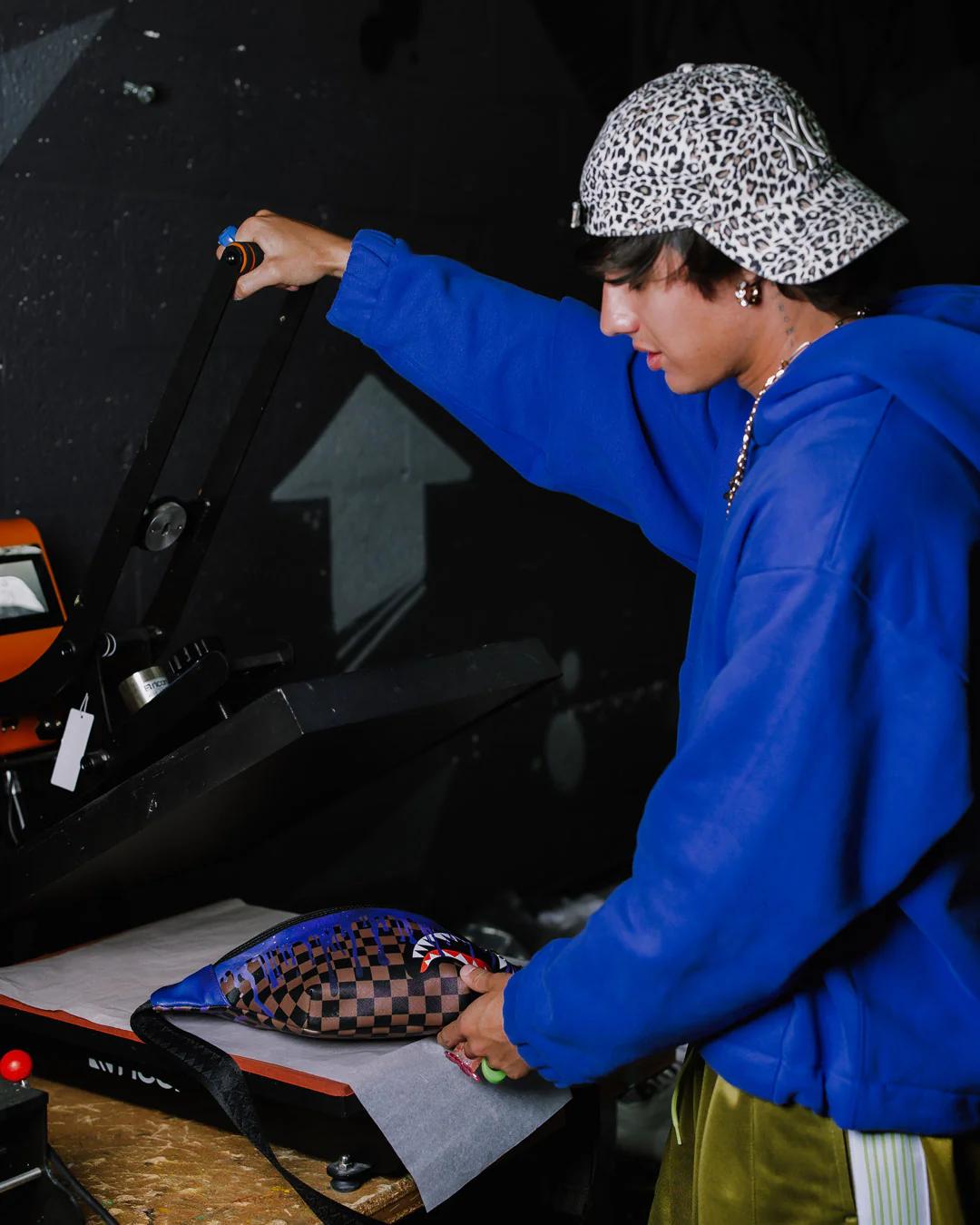 Sprayground Trending | CHAMPION OF THE GALAXY SAVVY CROSSBODY
