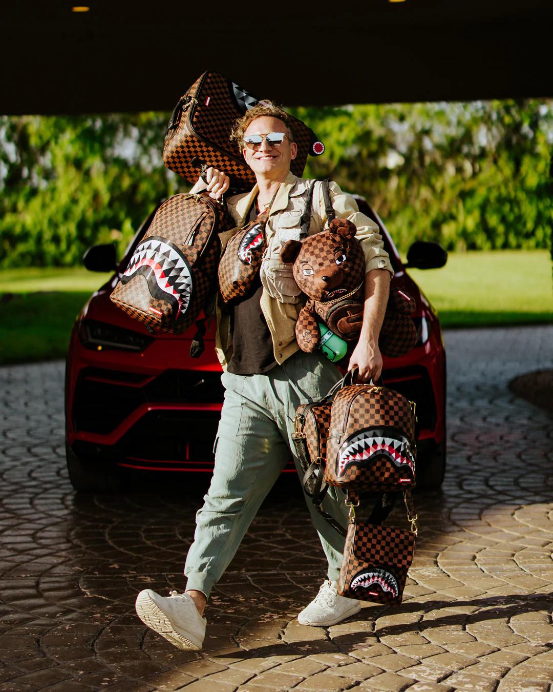 Sprayground Featured | LENTICULAR EFFECTS CROSSOVER CLUTCH W/ SHOULDER STRAP