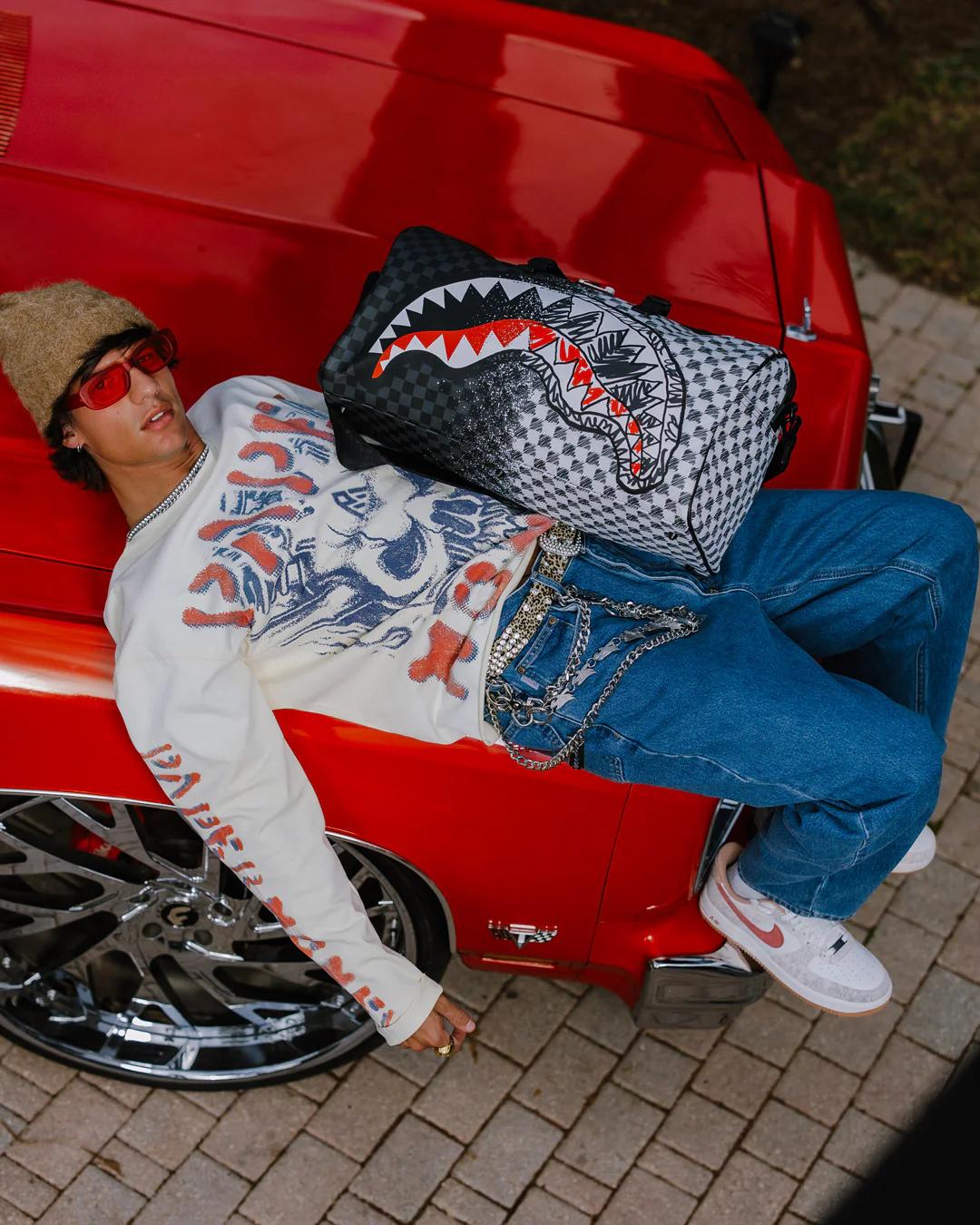Sprayground Trending | SCRIBBLE DRIBBLE CHECK DUFFLE