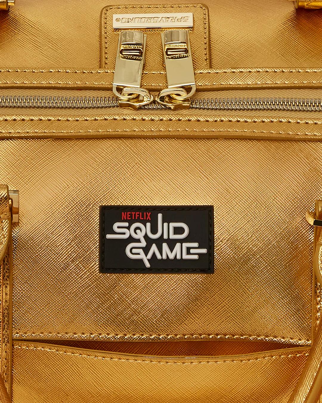 Sprayground Recommended | SQUID GAME COLLAB PIGGY BANK DUFFLE
