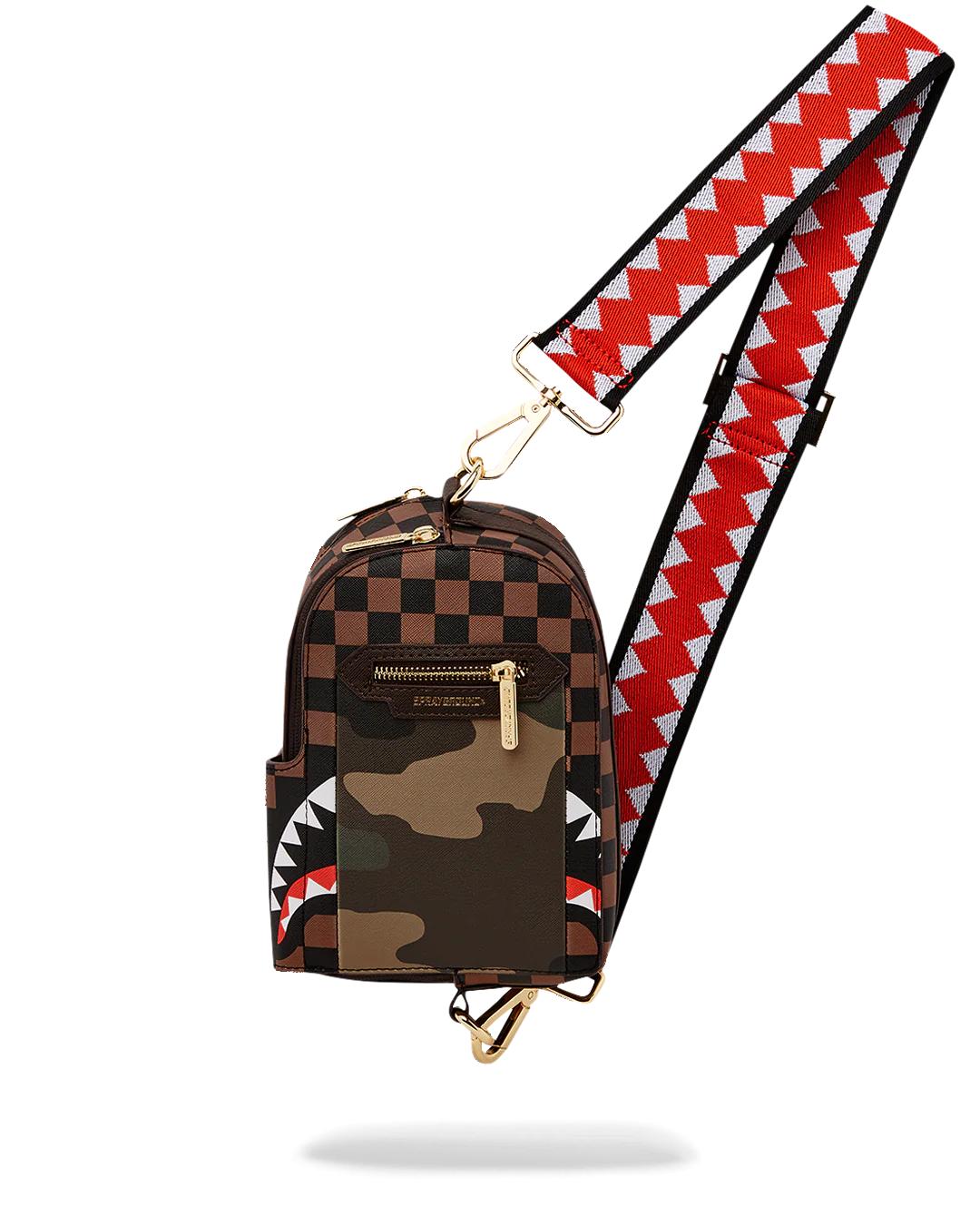 Sprayground Signature | EXTERIOR GOLD ZIP POCKET SHARKS IN PARIS BACKPACK SLING