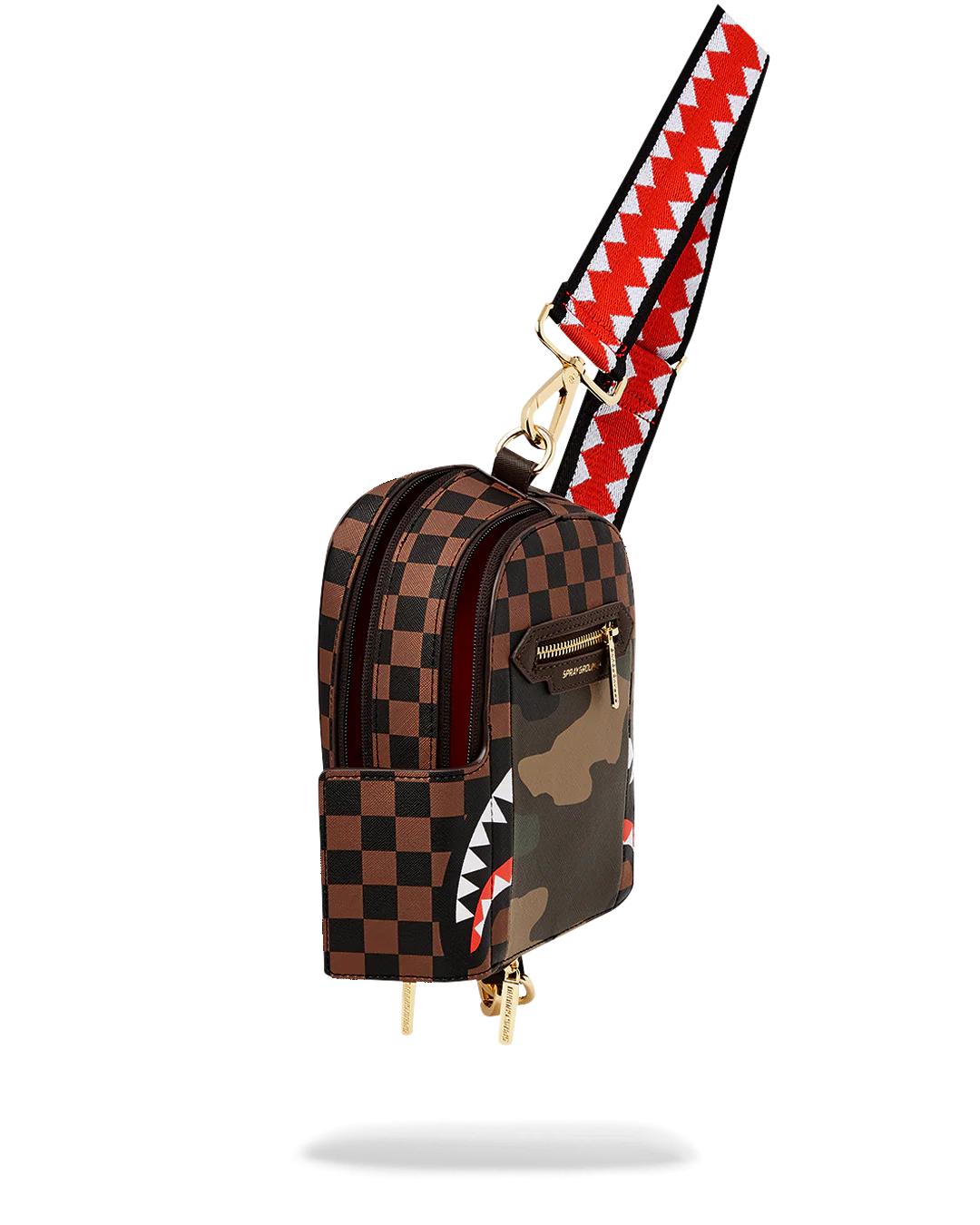 Sprayground Signature | EXTERIOR GOLD ZIP POCKET SHARKS IN PARIS BACKPACK SLING