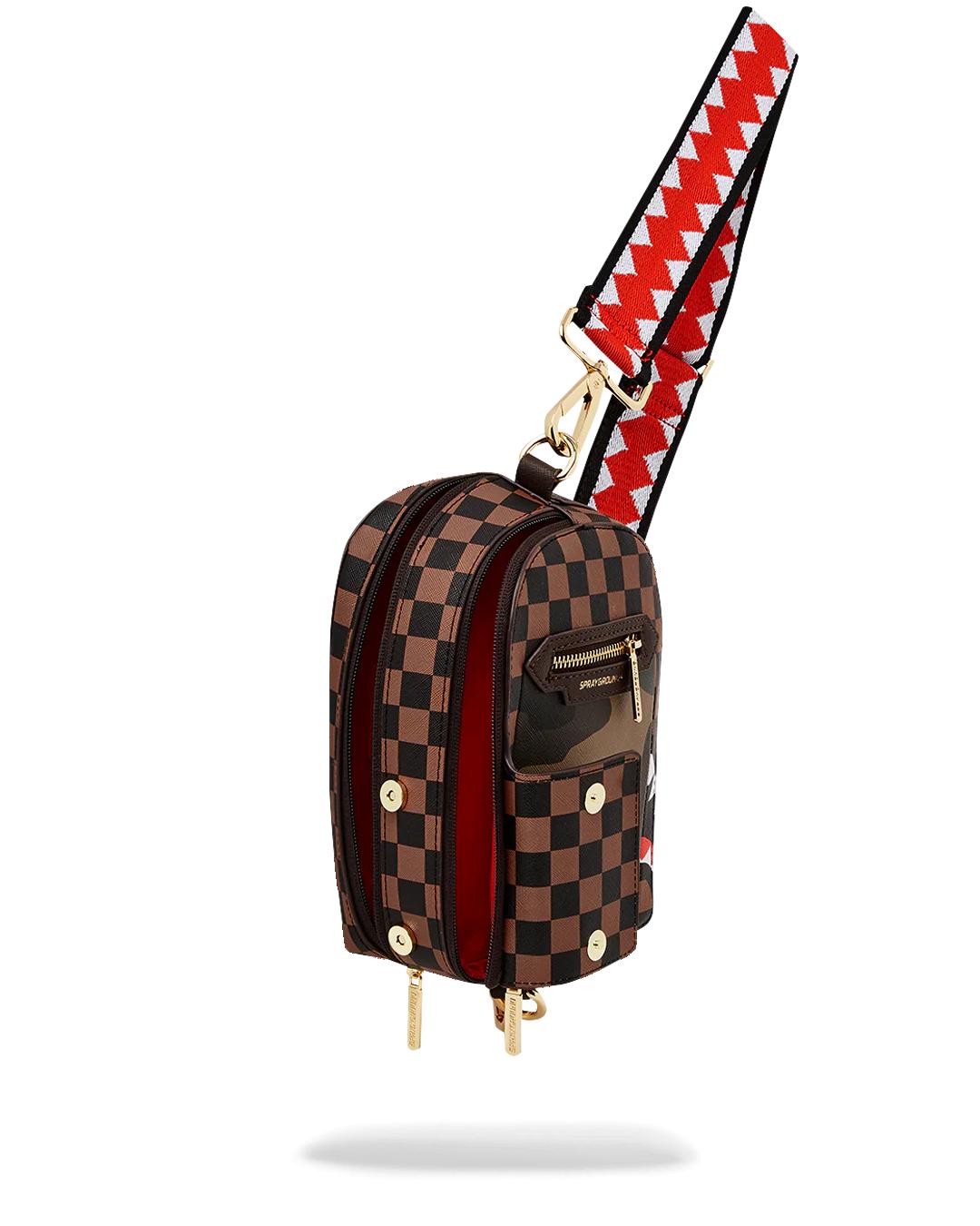 Sprayground Signature | EXTERIOR GOLD ZIP POCKET SHARKS IN PARIS BACKPACK SLING