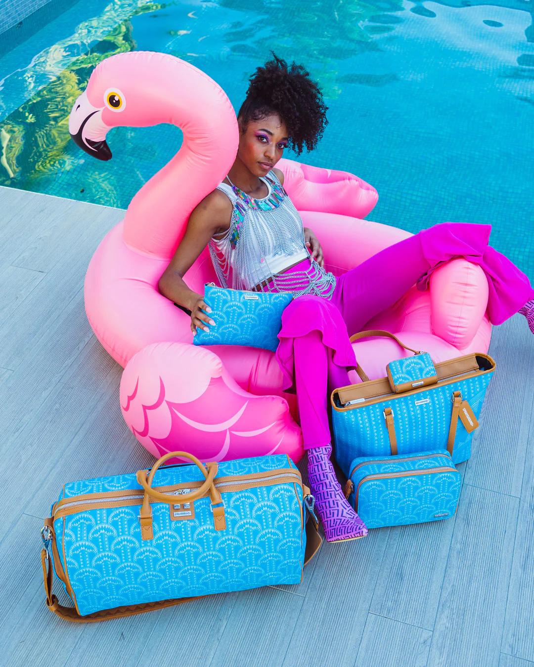 Sprayground Featured | ILLUCHAINS TURQ TOILETRY BAG