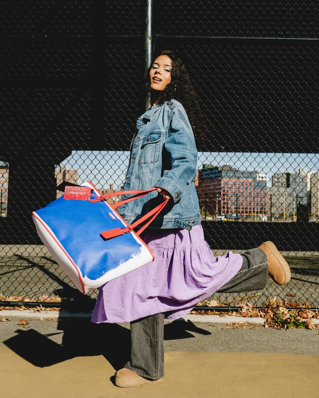 Sprayground New | KEITH HARING THE BIG BLUE PURSE ART TOTE