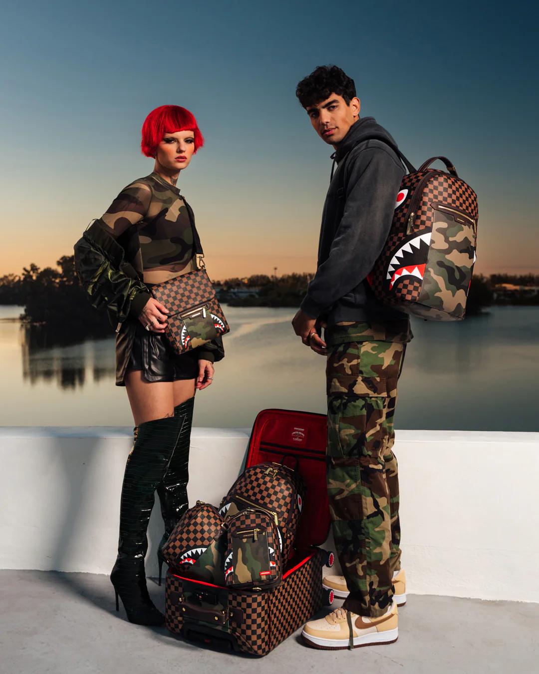 Sprayground Classic | EXTERIOR GOLD ZIP POCKET SHARKS IN PARIS JETSETTER CARRY-ON LUGGAGE