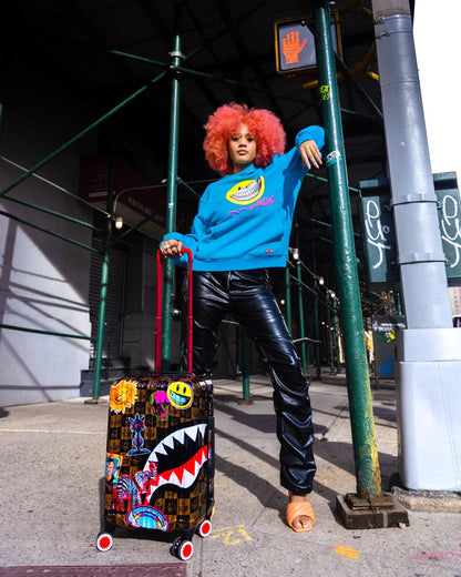 Sprayground Signature | GLOBAL MOGUL POPAGANDA RON ENGLISH EDITION HARDSHELL CARRY-ON LUGGAGE