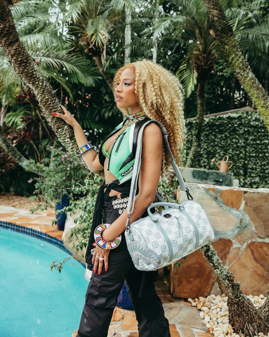 Sprayground Trending | A.I.8 AFRICAN INTELLIGENCE BOOKED & BUSY MINI DUFFLE