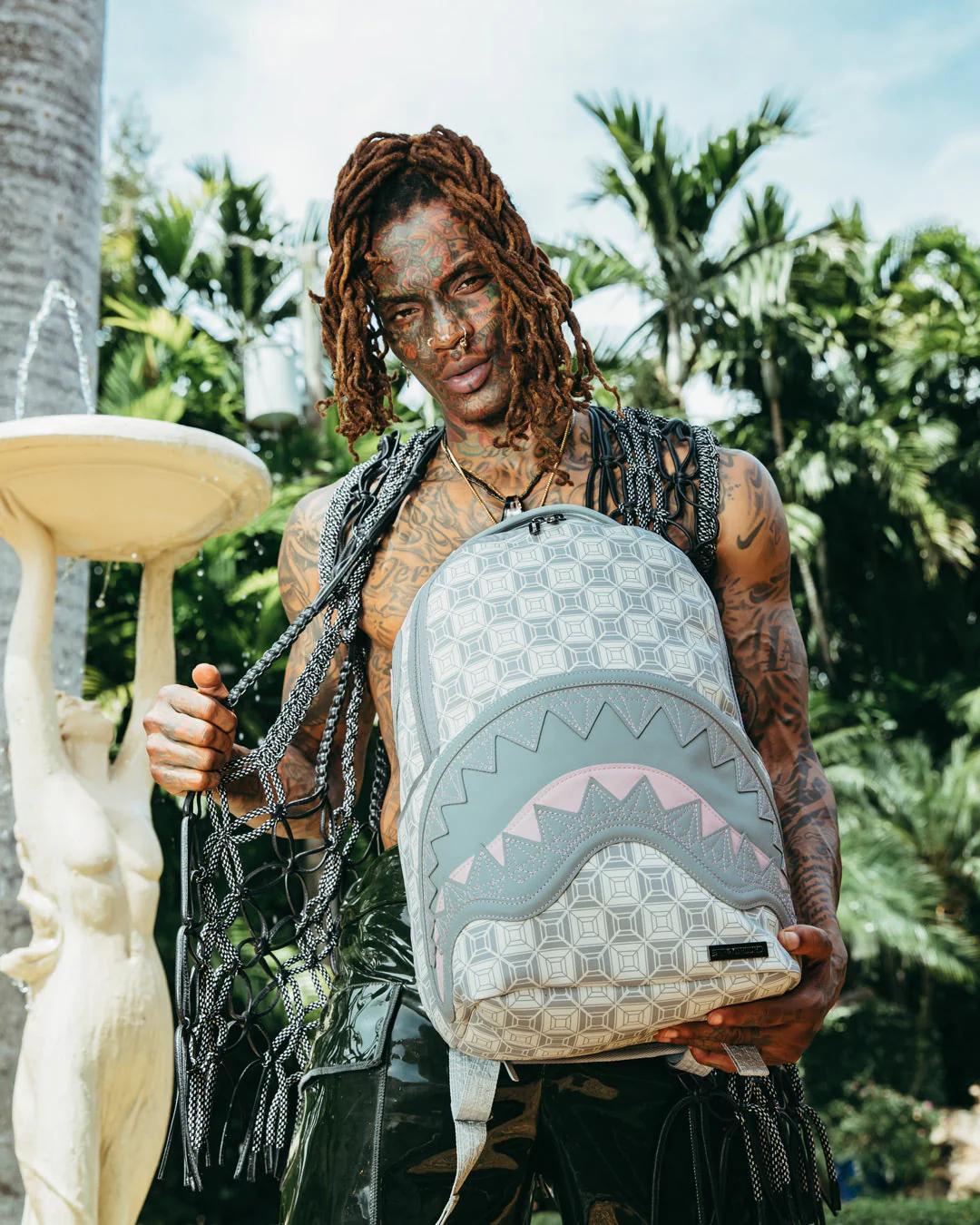 Sprayground Best Seller | A.I.8 AFRICAN INTELLIGENCE BOOKED & BUSY BACKPACK