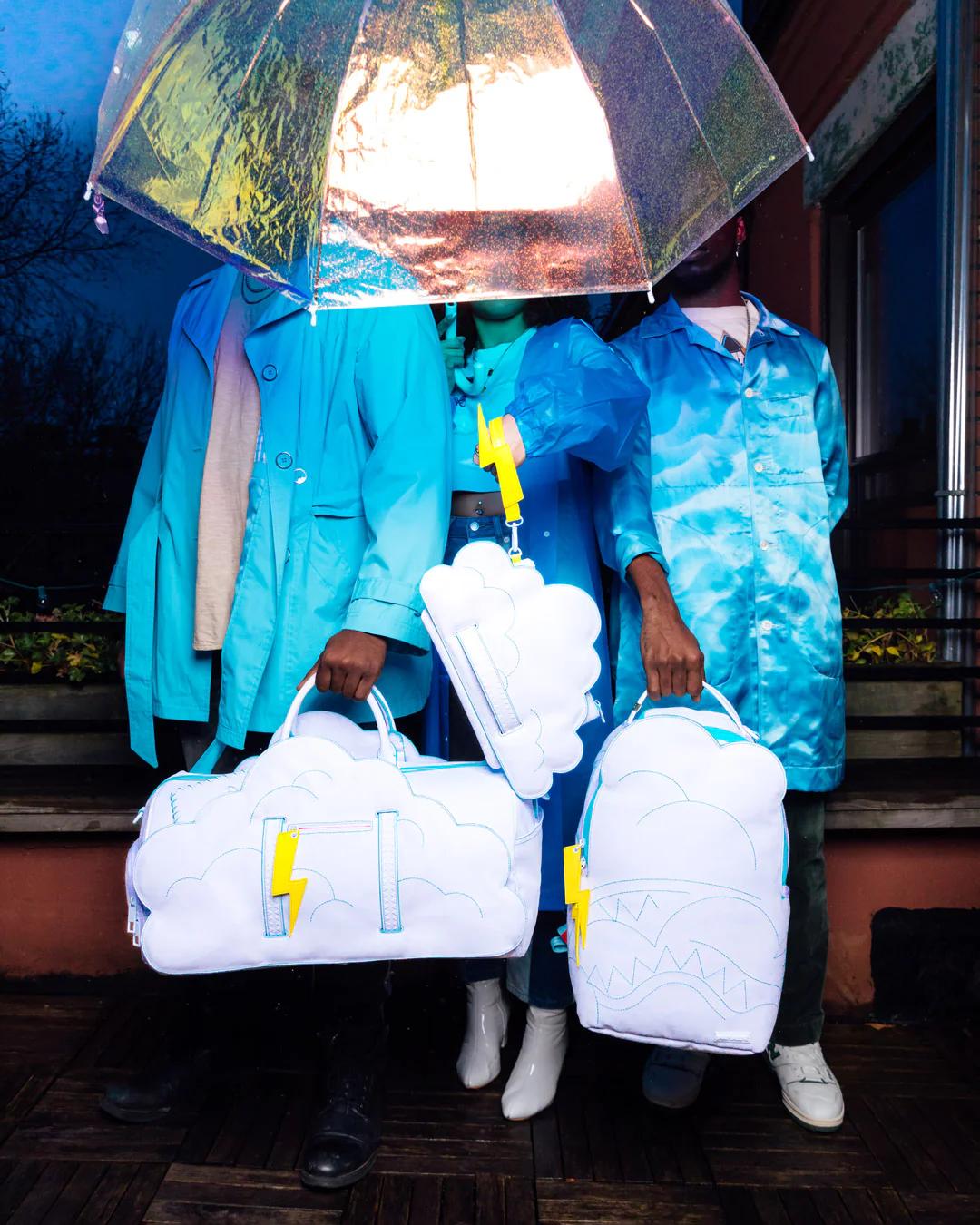 Sprayground Featured | CLOUDY WITH A CHANCE OF SHARK CROSSOVER CLUTCH