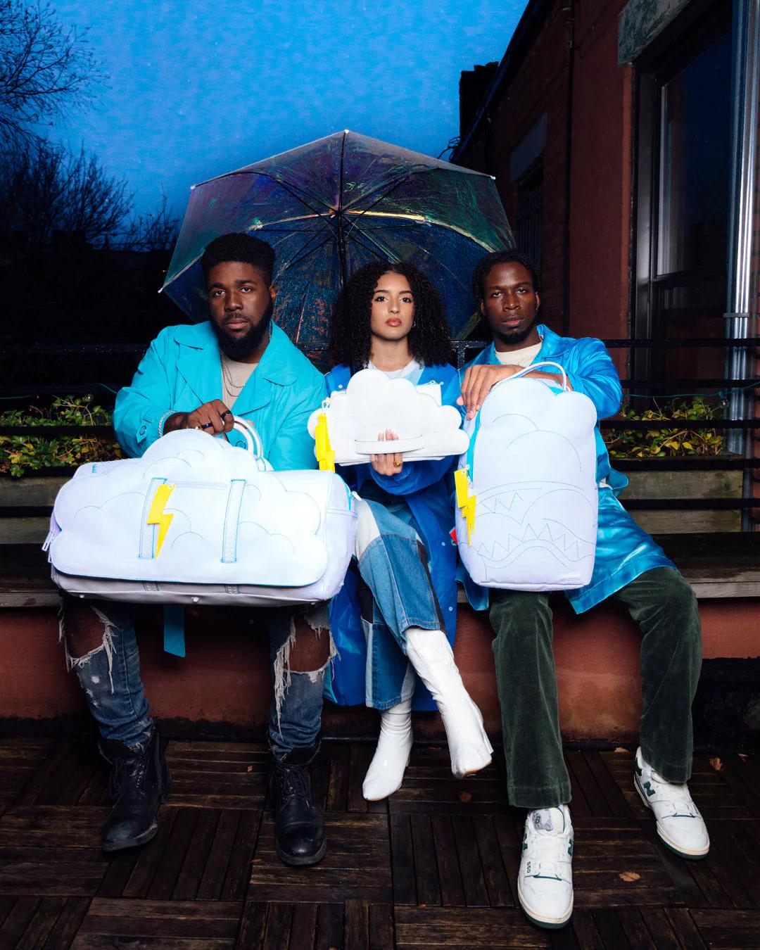 Sprayground Featured | CLOUDY WITH A CHANCE OF SHARK CROSSOVER CLUTCH