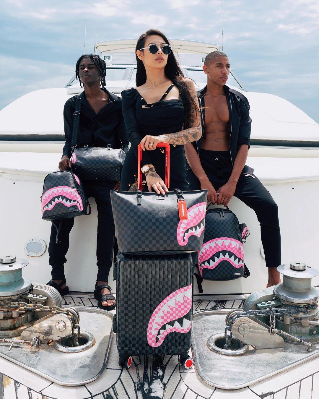Sprayground Trending | SHARKS IN CANDY CARRY-ON LUGGAGE