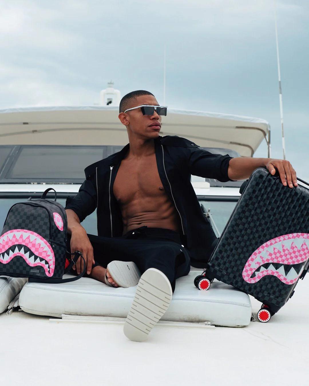 Sprayground Trending | SHARKS IN CANDY CARRY-ON LUGGAGE