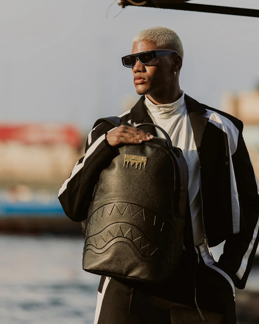 Sprayground Exclusive | GOLD BRICK DRIP BLACK BACKPACK