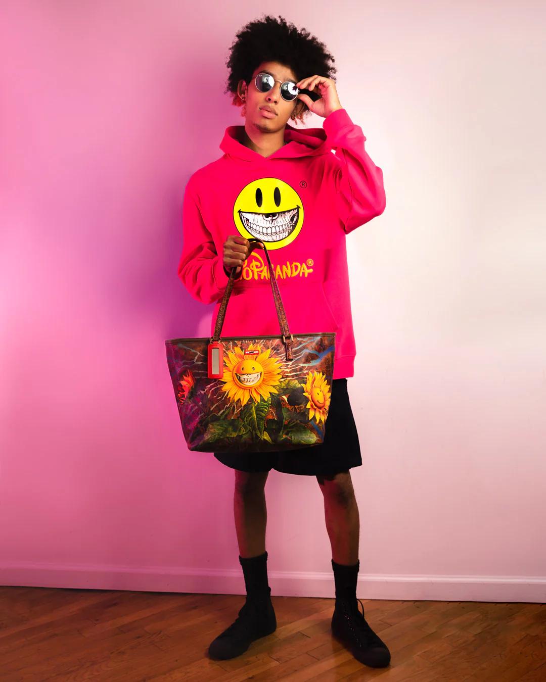 Sprayground Signature | SUNFLOWER GRIN RON ENGLISH COLLAB TOTE