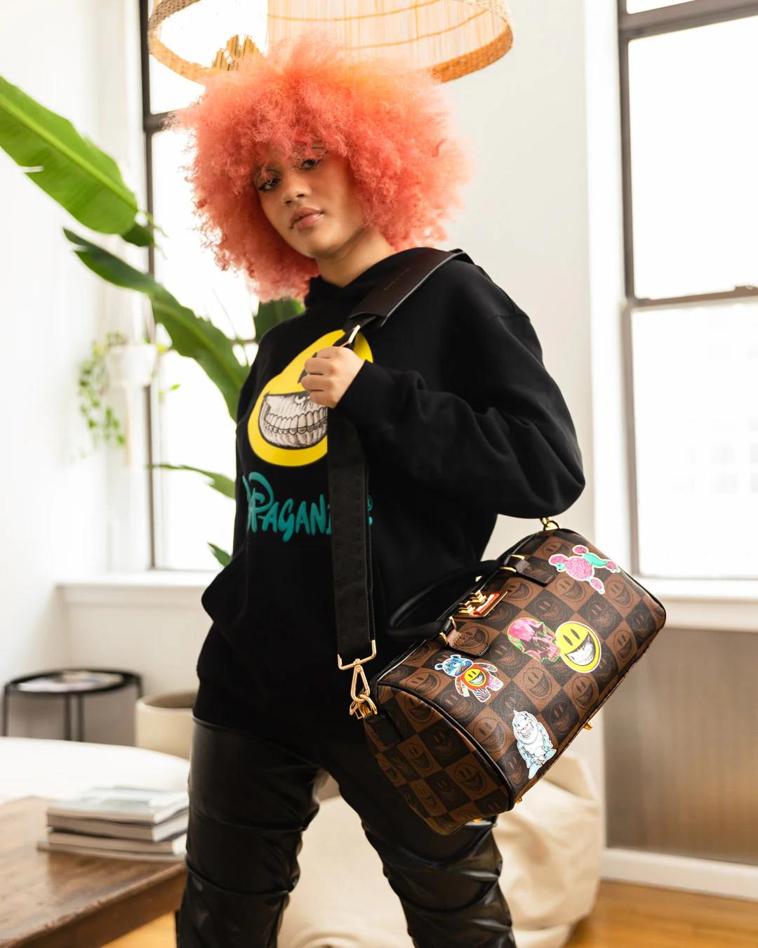 Sprayground Popular | GLOBAL MOGUL POPAGANDA RON ENGLISH EDITION MINI DUFFLE