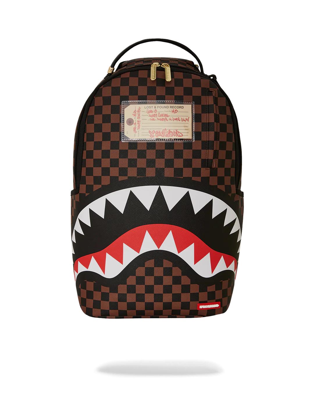 Sprayground Best Seller | SHARKS IN PARIS LOST & FOUND BACKPACK