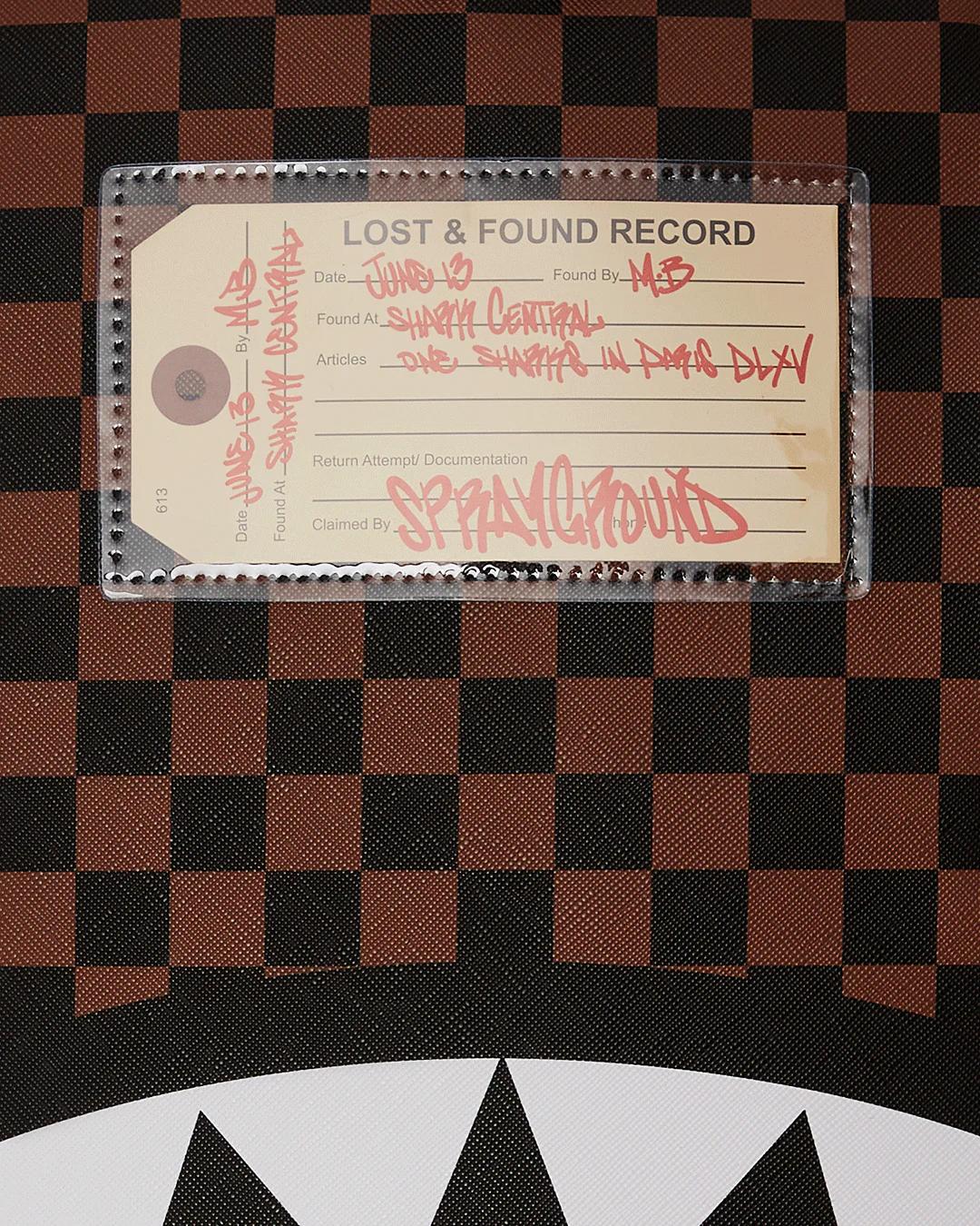 Sprayground Best Seller | SHARKS IN PARIS LOST & FOUND BACKPACK